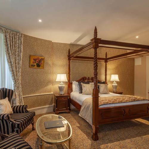 Four post bed in elegant castle hotel suite